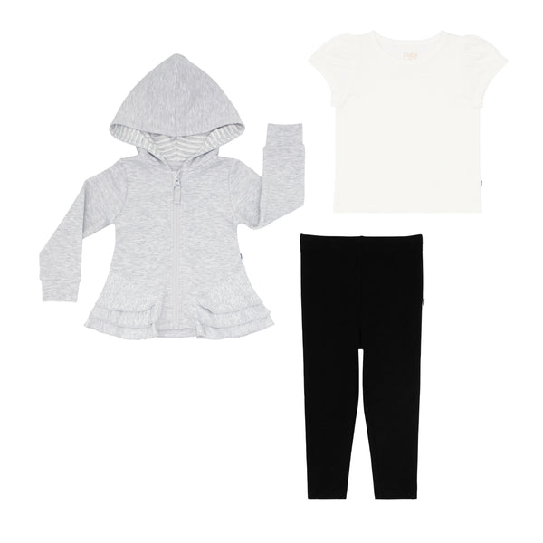 flat lay composite of a light heather gray peplum hoodie, soft white puff sleeve tee, and black legging