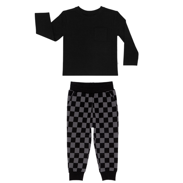 flat lay composite of a black relaxed pocket tee and monochrome checks jogger