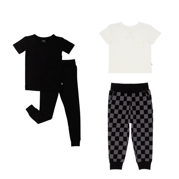 flat lay composite of a black two-piece short sleeve pajama set, soft white relaxed pocket tee, and monochrome checks jogger