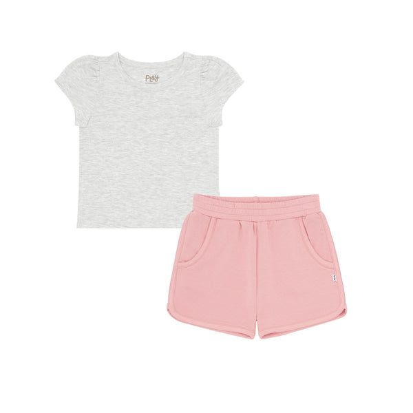flat lay composite of a light heather gray puff sleeve tee and mauve blush dolphin shorts