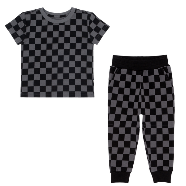 flat lay composite of a monochrome checks relaxed tee and jogger