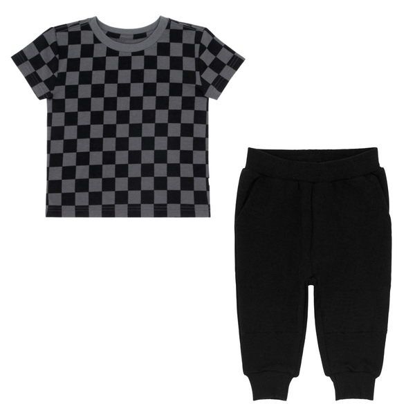 flat lay composite of a monochrome checks relaxed tee and black jogger