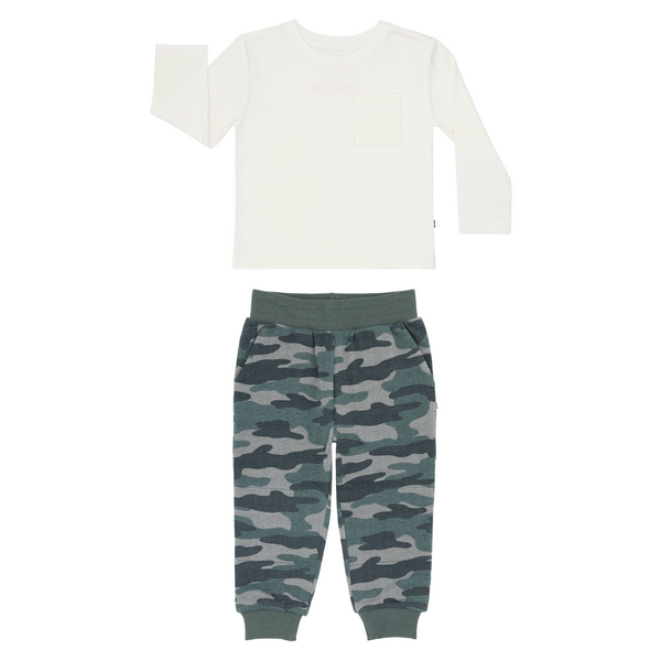 flat lay composite of a soft white relaxed pocket tee and vintage camo jogger
